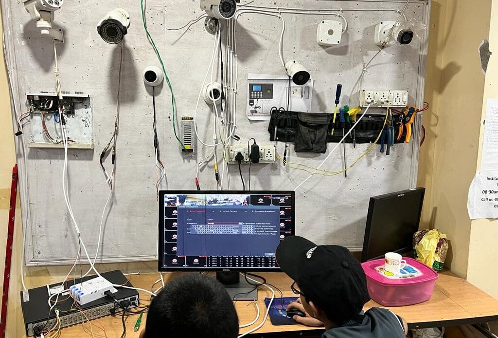 "CCTV training session on dome camera installation and setup at Techcare Solutions."