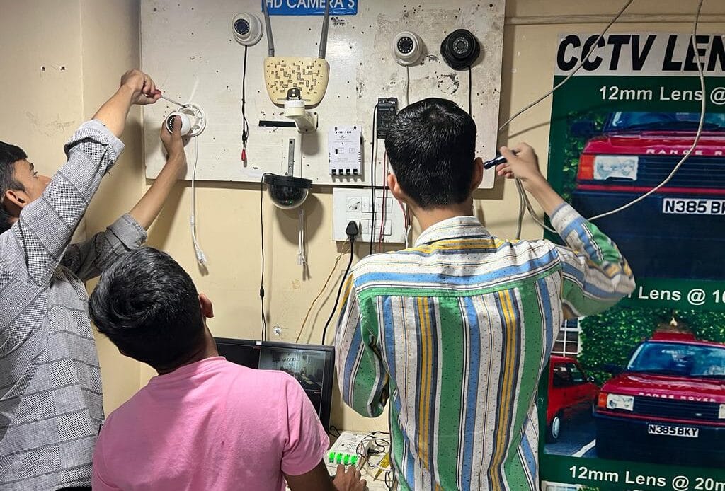     "Auto Iris camera setup tutorial during CCTV training course at Techcare Solutions."

Image: Group Learning CCTV Networking
